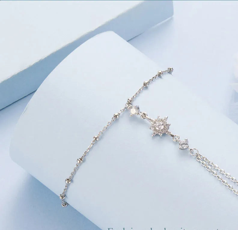 S925 sterling silver integrated ring and bracelet set with eight-pointed star ornament on white background