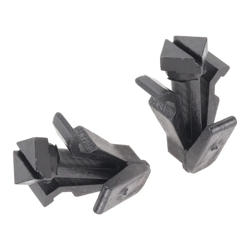 Black plastic automotive fastening clip for Nissan bumper and radiator grille, part number 76882-0M060