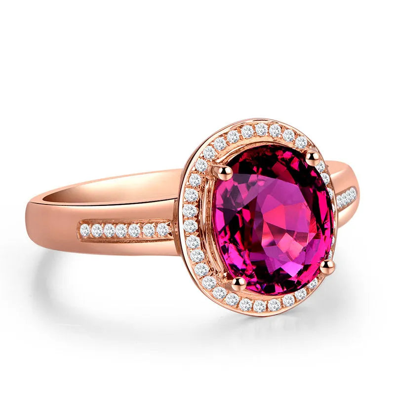 Geometric copper ring with gold-plated inlaid red crystal stones on rose gold adjustable band
