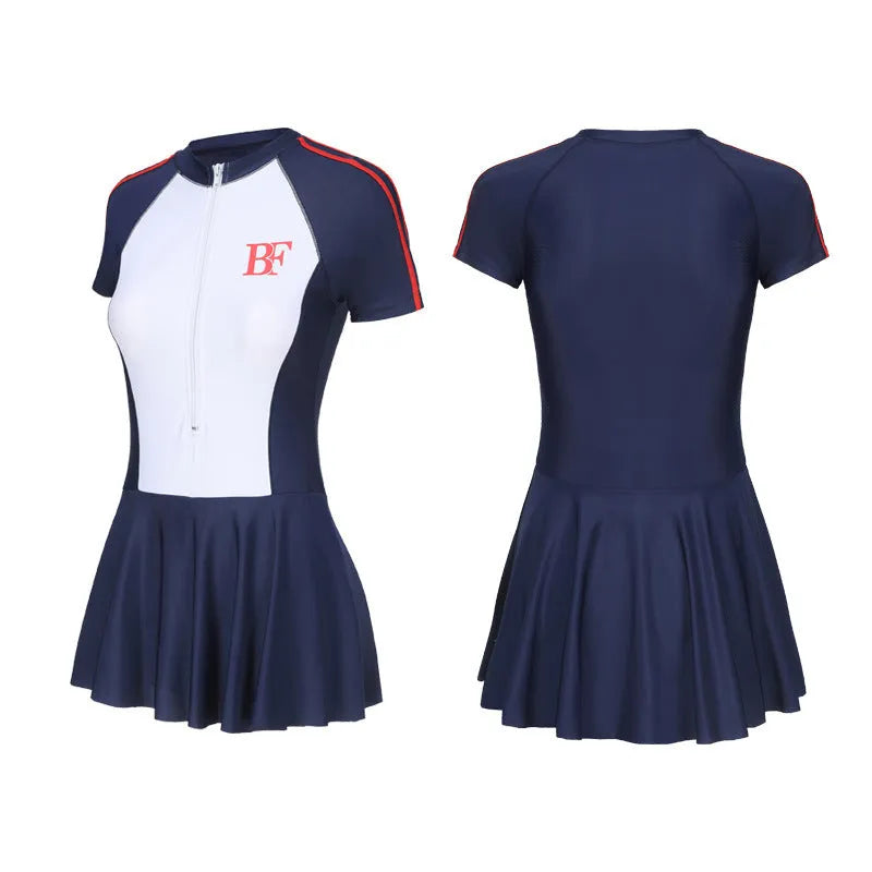Ladies conservative sports one-piece swimsuit in a colour-matching pattern, shown on a model.