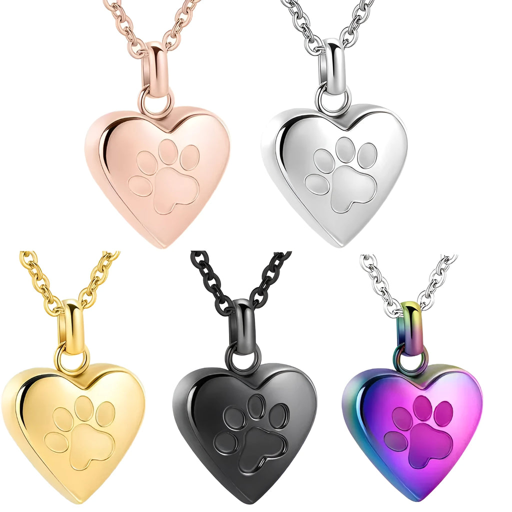 Silver heart pendant necklace with paw print design that opens as a casket.