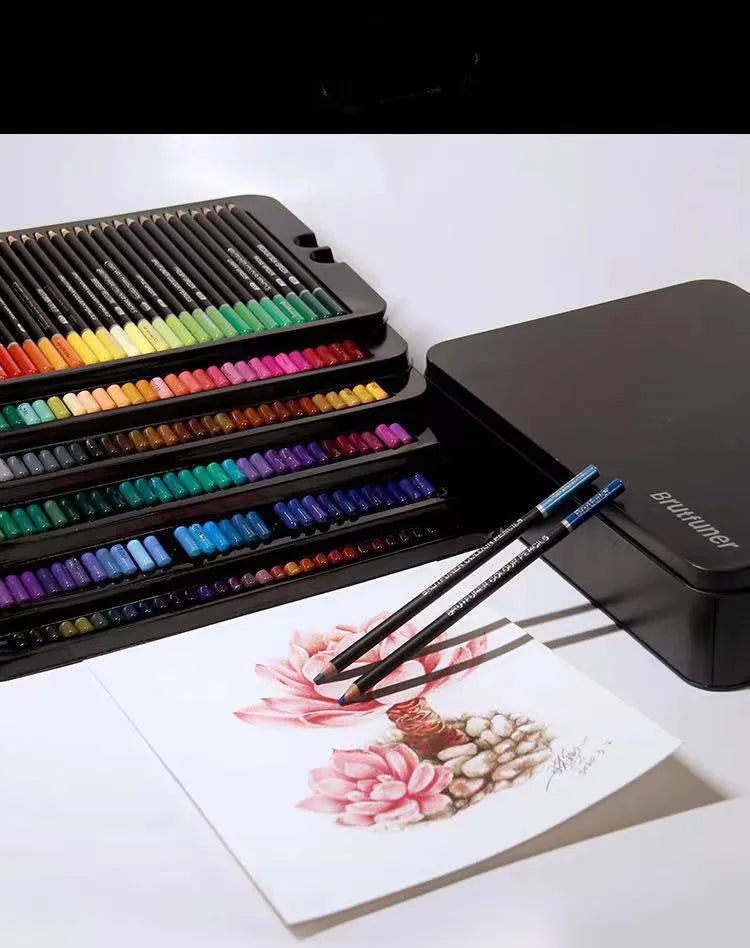 Metal tin box open to show a rainbow assortment of oily colour pencils with wooden barrels.
