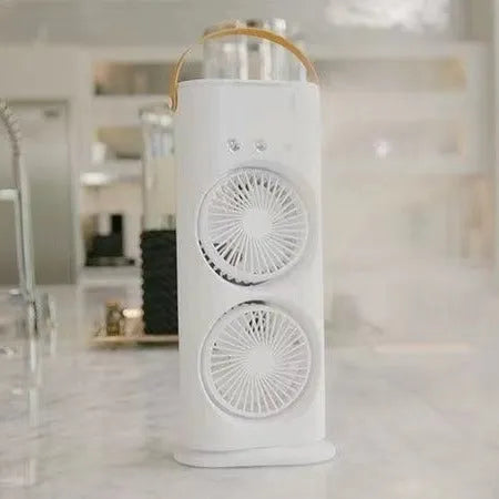 White portable USB humidifier fan with remote control on a desk