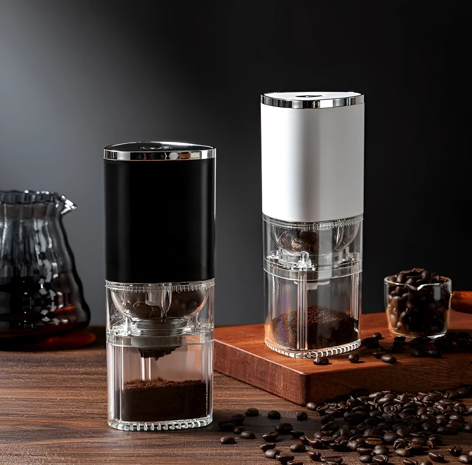 White portable electric coffee grinder with ceramic burr and USB charging cable on a kitchen counter.