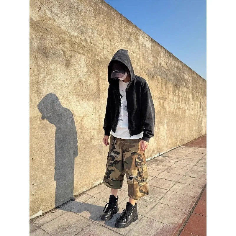 Men's camouflage cropped jeans with patch ripped detailing and loose straight-leg cut
