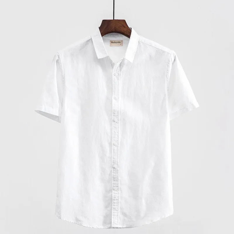 Men's light blue linen short sleeve shirt with a square collar on a hanger.