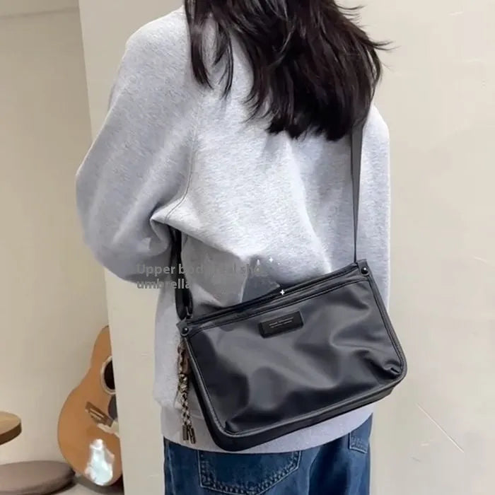 Small square Oxford cloth crossbody bag in trendy cool colour for street style leisure travel