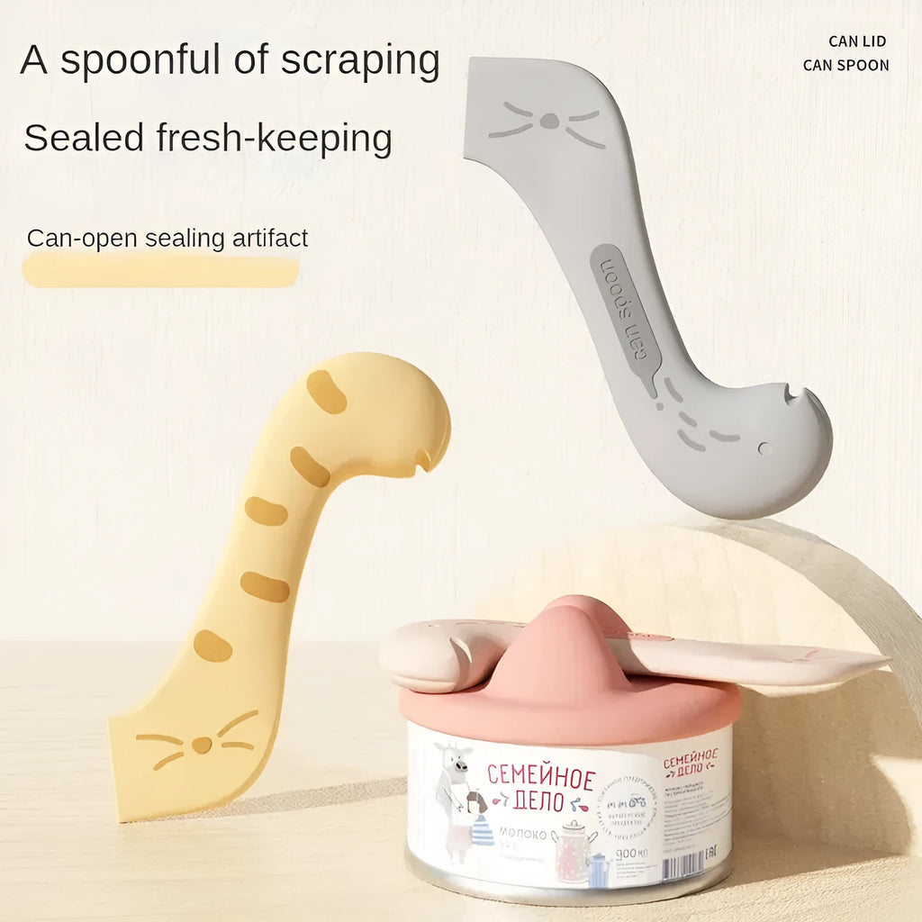 Silicone pet food mixing spoon and flexible can sealing lids in grey, pink and yellow colours.