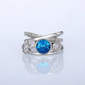 Retro hollow inlaid round copper ring in white gold colour with zircon stones