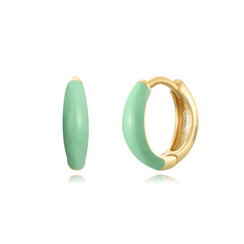 Oval-shaped curved drop earrings with colourful epoxy resin drip finish and silver metal pin.