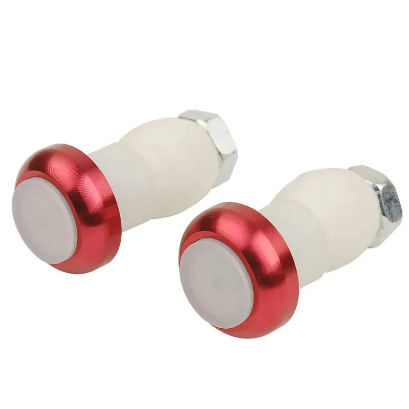 A pair of anodised aluminium bicycle handlebar safety lights in a choice of colours, showing the LED lens and mounting nut.