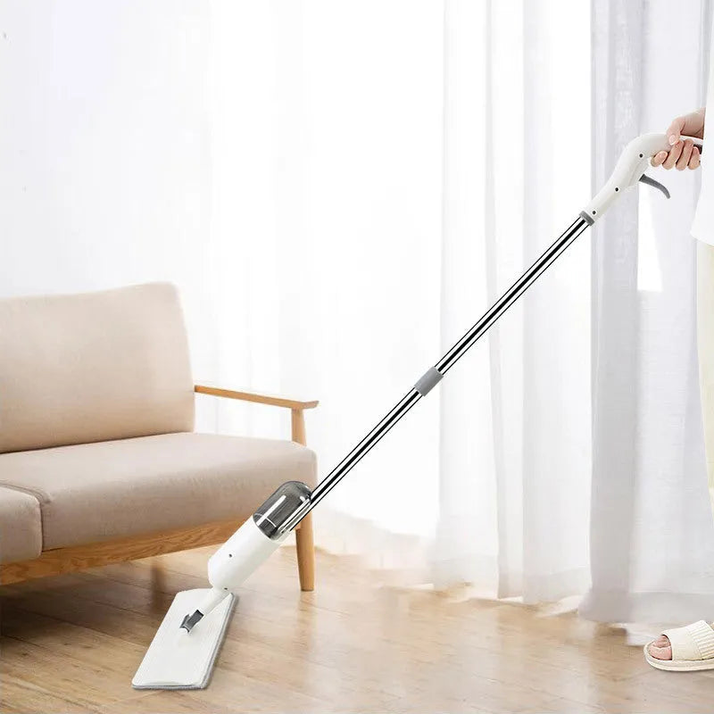 Flat squeeze mop with blue bucket and grey microfiber pad, rotating to show 360-degree head movement.