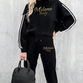Women's casual suit with black round-neck top and matching polyester trousers, long sleeves, contrast-colour detailing