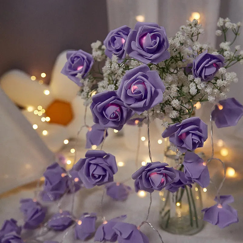 Indoor battery-powered LED rose decorative light string in one of seven colour options