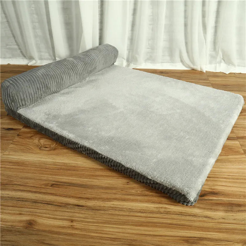 Corduroy dog bed with bolster sides in coffee colour on hardwood floor