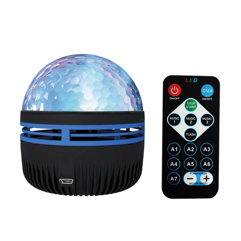 LED star galaxy projector lamp with colourful rotating patterns on a bedroom table