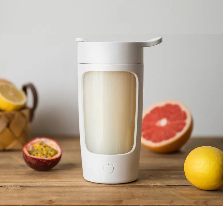 Portable automatic blender cup in black, blue, pink, or white colours showing 650ml capacity