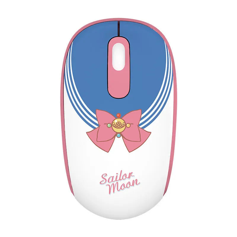 Pink Sailor Moon cartoon wireless mouse with USB receiver on a desk