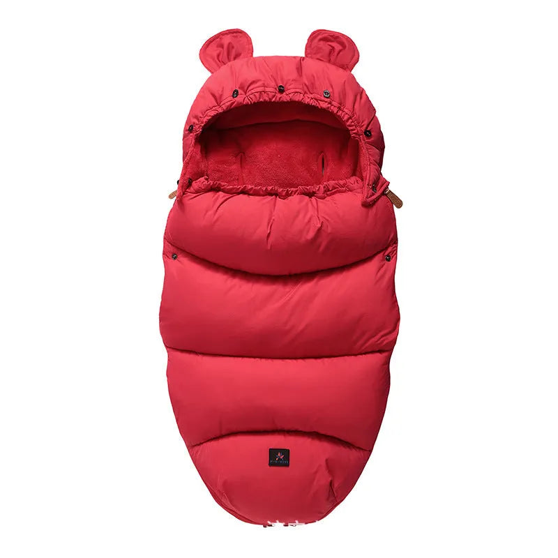 Convertible baby sleeping bag cocoon in a pram, showing cotton blend fabric and flannel lining.