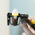 Black ABS plastic car cup holder with universal fit and spill-resistant design for vehicles