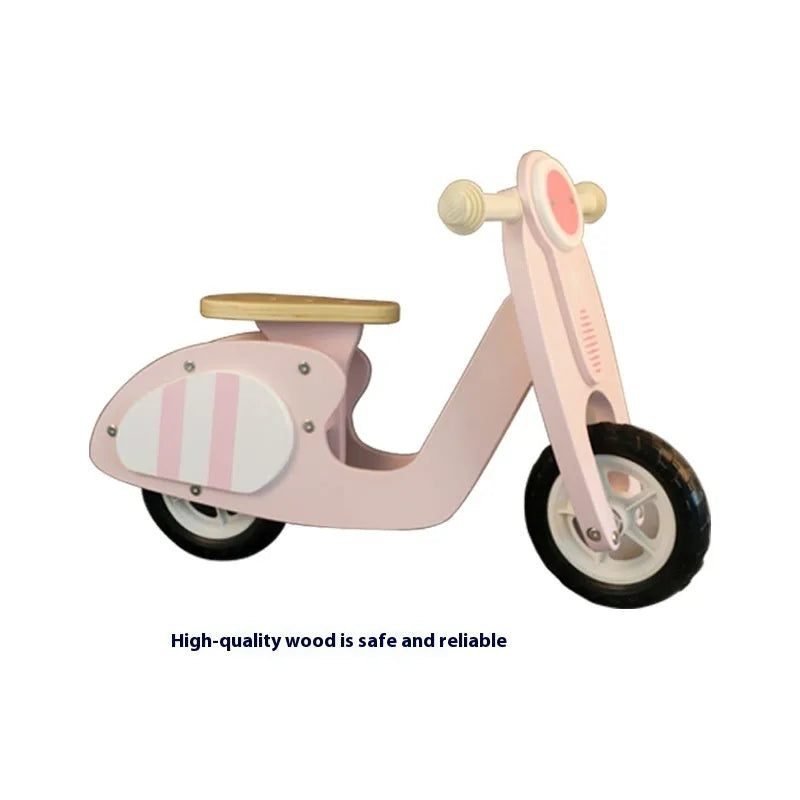 Pink wooden toddler balance scooter with 10-inch deck for children aged 1-6 years.