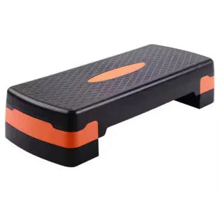 Grey Fit Step aerobic platform on a wood floor, showing its 68cm length and 15cm height.