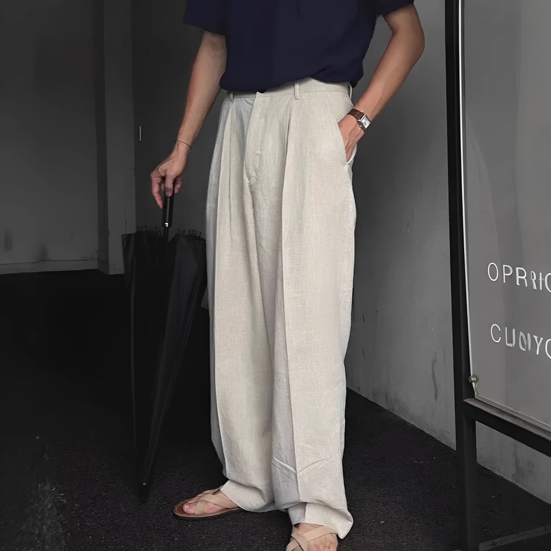 Men's light-weight apricot wide-leg cotton linen trousers with a non-iron finish on a hanger.