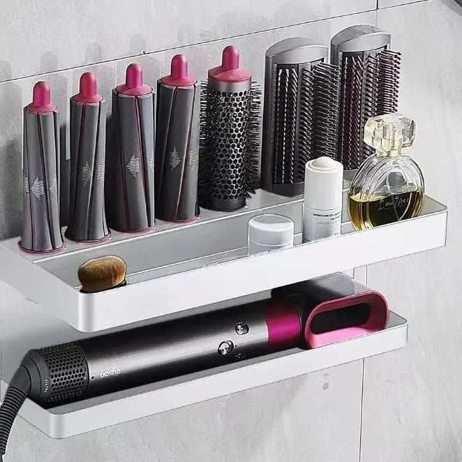 White double-layer aluminum bathroom storage rack with Marcel wave curlers organised on adhesive-mounted wall unit