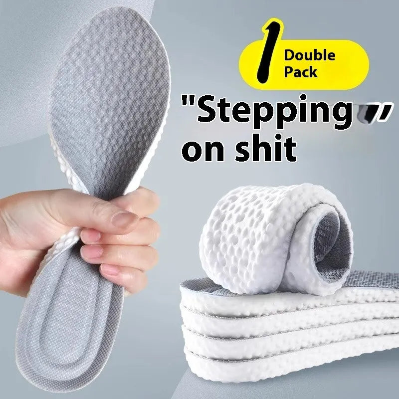 Breathable deodorant sports insoles in grey, black, and orange colours on a white background.