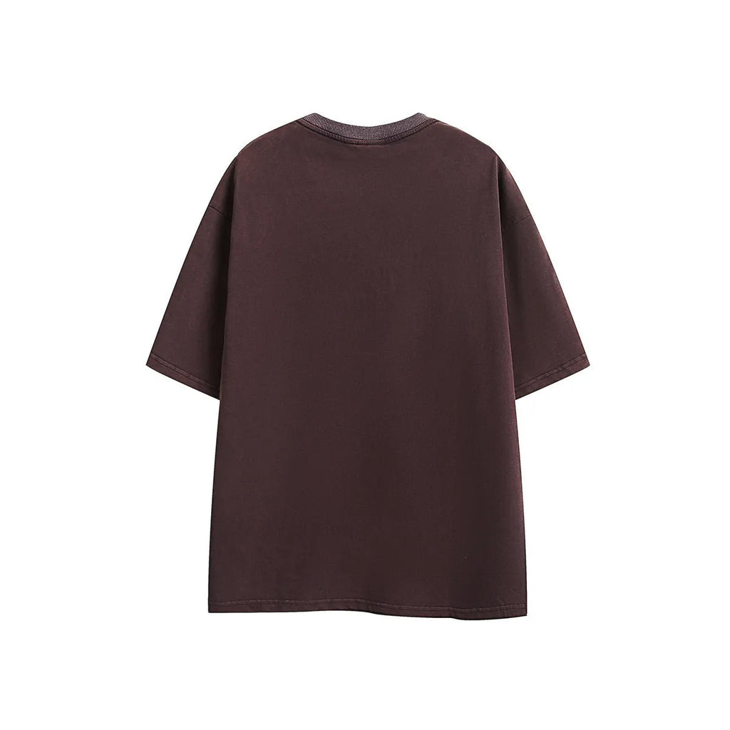 Men's purple embroidered retro cotton short-sleeve t-shirt with a loose fit on a neutral background.