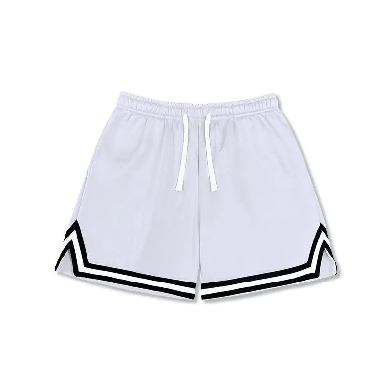 Man wearing loose-fit black polyester sports shorts for summer leisure activities.