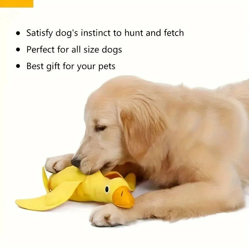 Yellow teddy dog training toy with integrated duck doll and food leak design for scent work