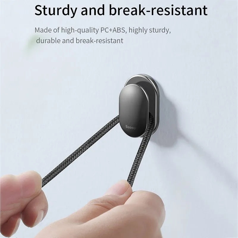Black mini car hook made of PC and ABS with 3M adhesive, suitable for vehicle and home use.