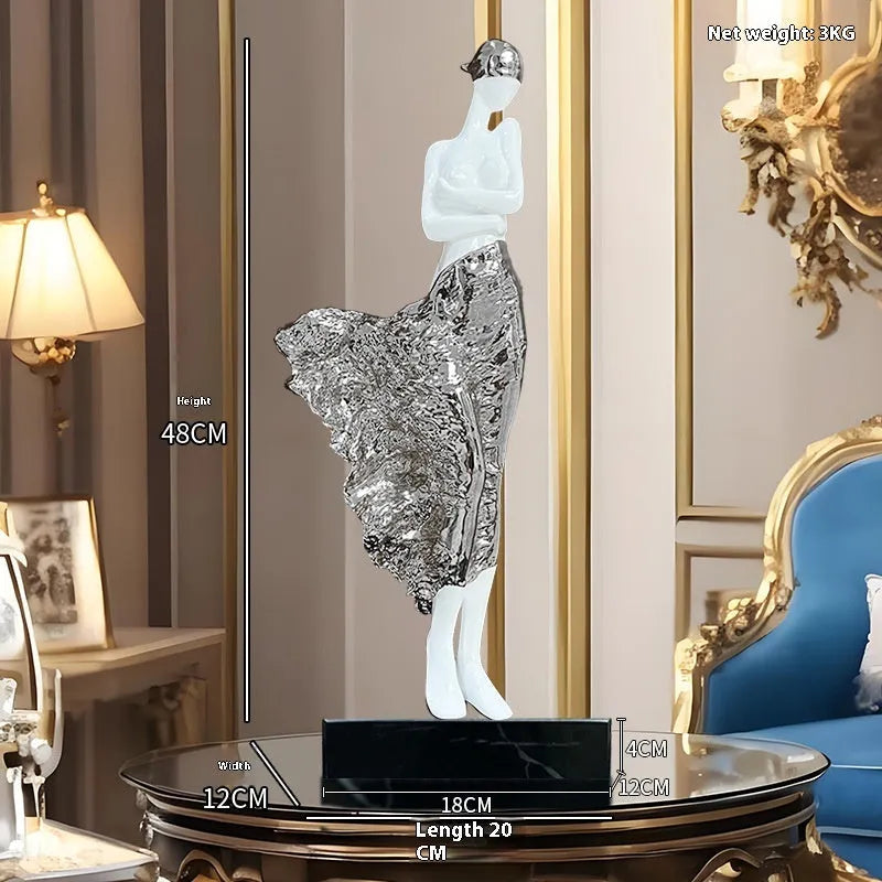 Modern sculptured resin ornament in rose gold or silver, 48cm high.