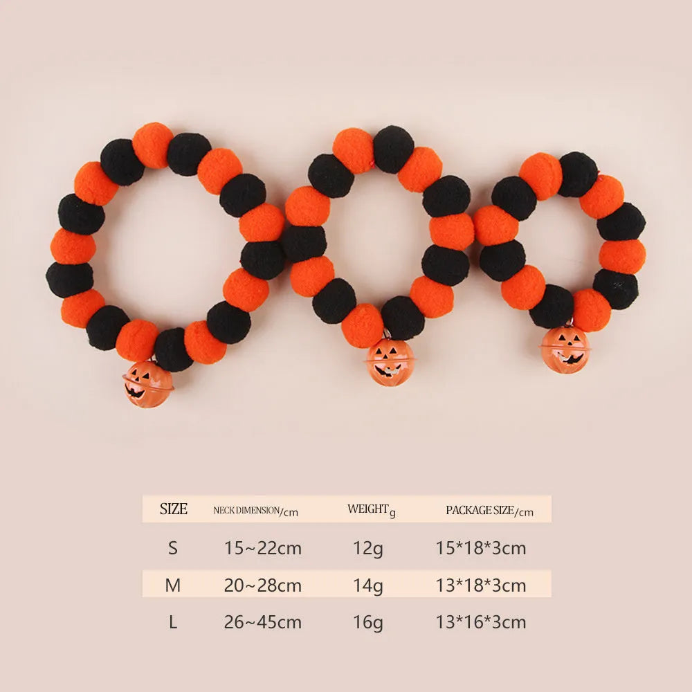 Orange and black Halloween cat collar with pumpkin design and plastic quick-release buckle.