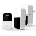 Modern white plastic wireless doorbell receiver and self-generating button unit.