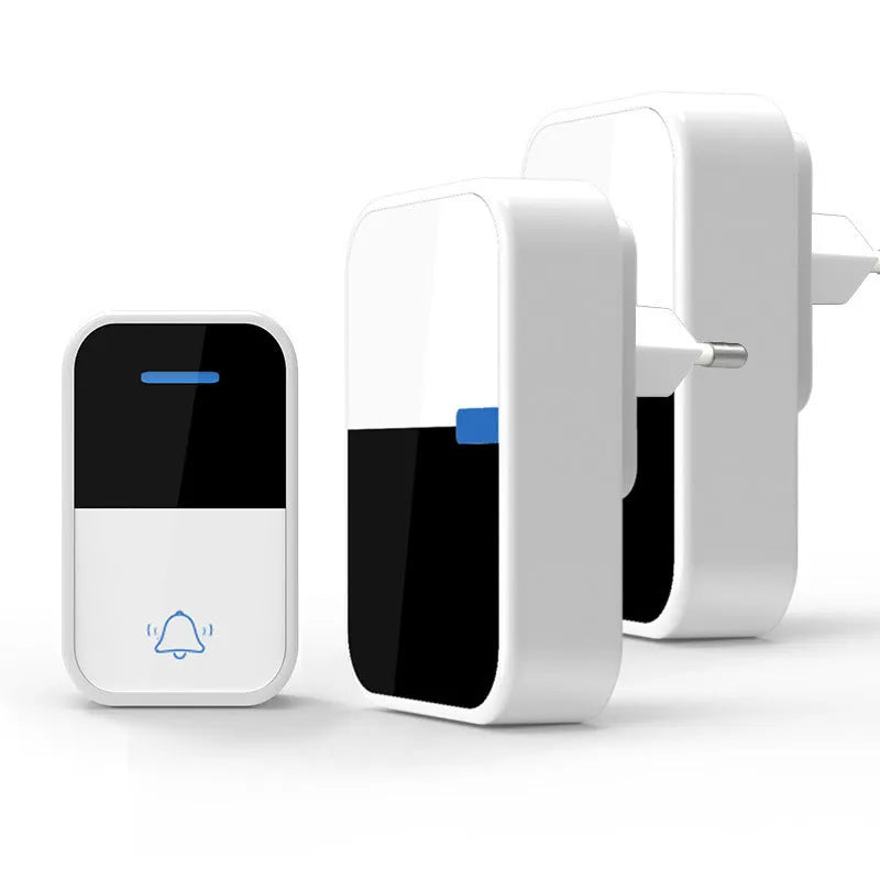 Modern white plastic wireless doorbell receiver and self-generating button unit.