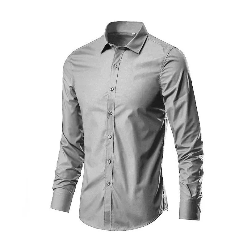 Man wearing a loose-fit light grey linen long-sleeve shirt, casual slim style.