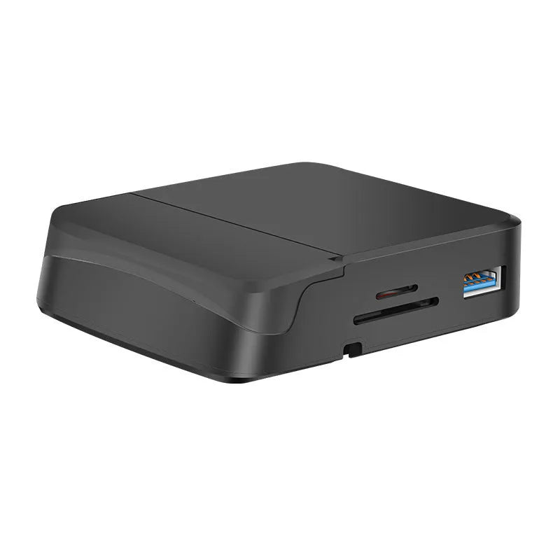 Black USB-C docking station with integrated bracket stand for laptops, featuring USB and HDMI ports, on a desk
