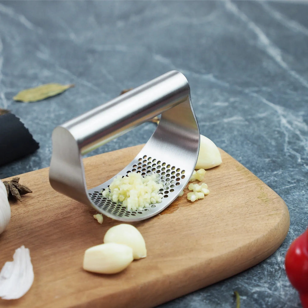 Stainless steel garlic press with PP handle and a separate onion fork kitchen tool