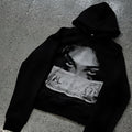 Black women's hoodie with cartoon pattern print, loose fit design