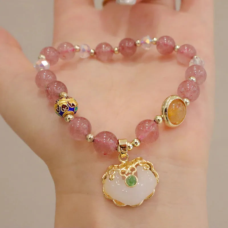 Women's geometric bracelet in choice of gray jade or strawberry quartz with ethnic metal decorations