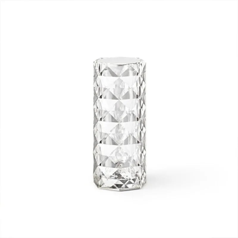 Modern acrylic rose LED table lamp with diamond base and touch control on wooden surface