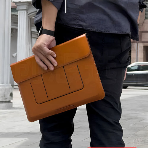 Brown 13.3 inch laptop bracket bag with integrated stand and storage compartments open.