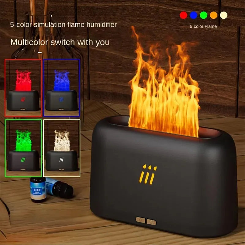 Black round flame aroma diffuser humidifier with LED lighting on wooden surface