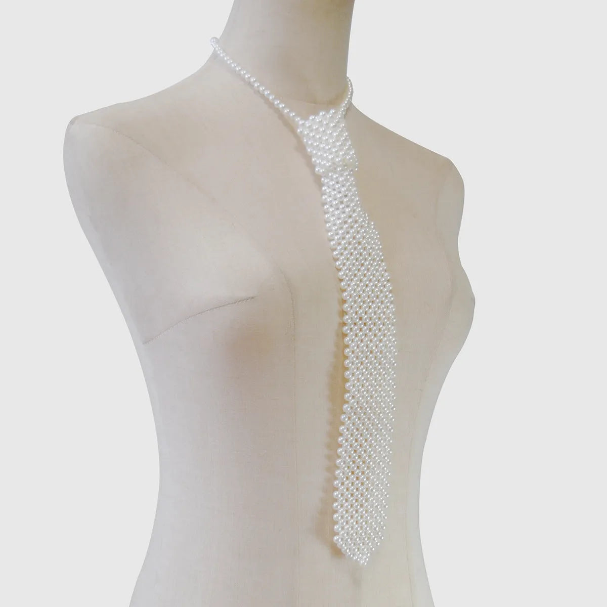Pearl tie body chain with hollow out retro design in black or white