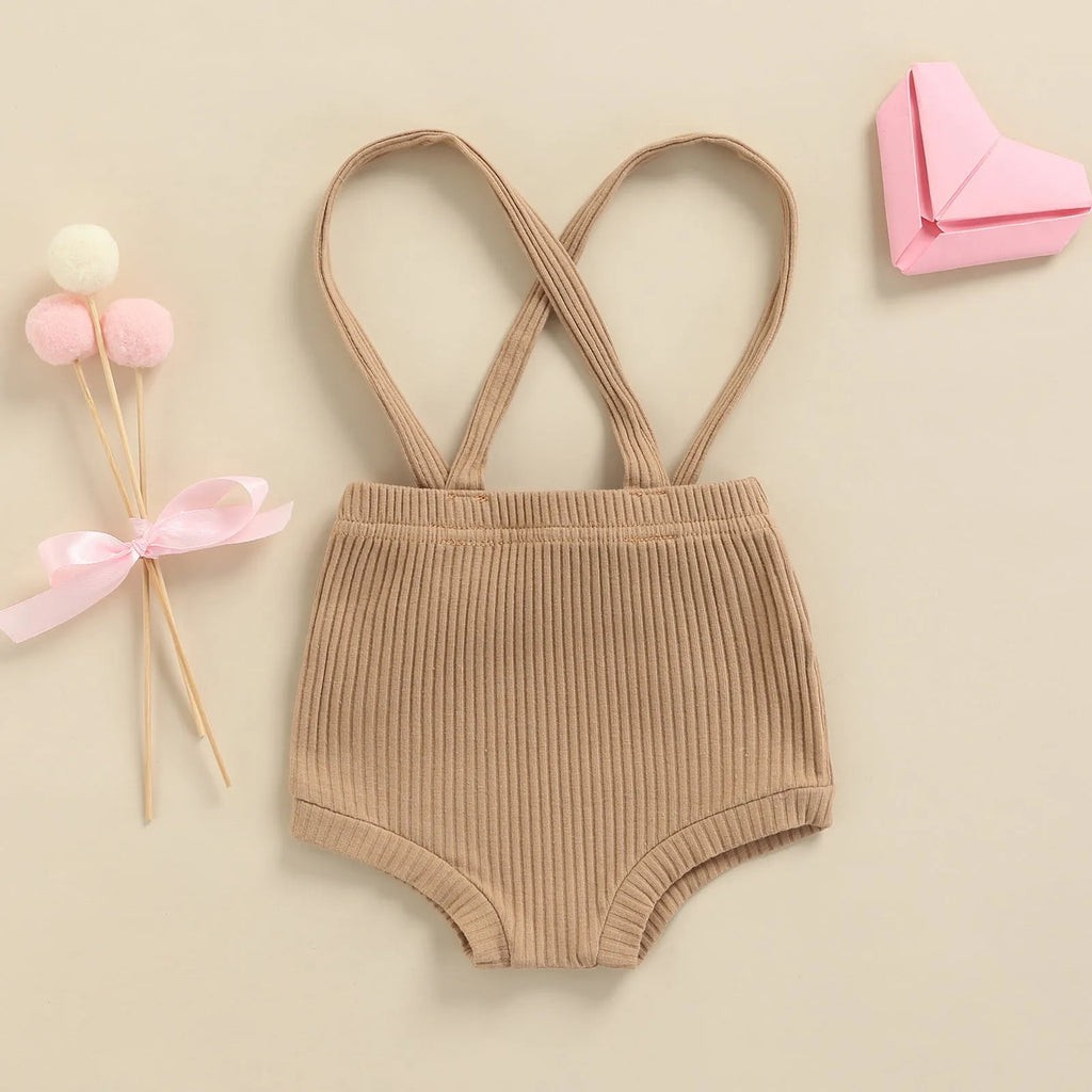 Baby carrier high waist triangle bottoming stretch pants in cotton solid colour on a model infant
