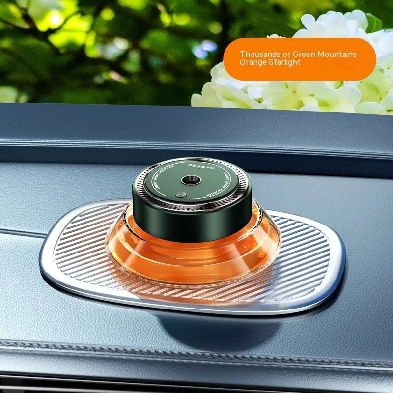 Smart spray car air freshener unit in Gentleman's Black or Qian Shan Cui colours with Ocean and Gulong fragrance refill bottles