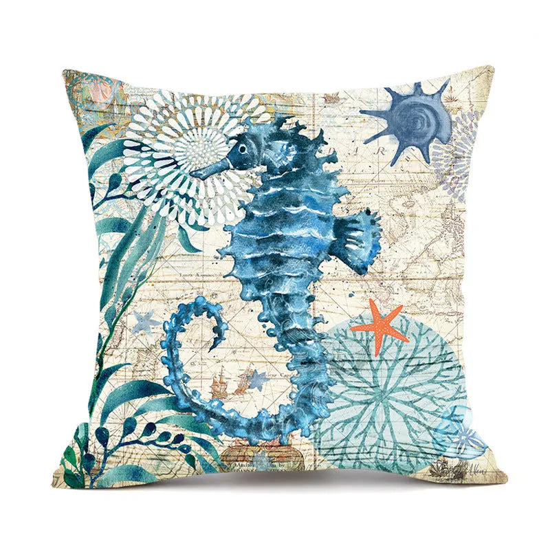 Square linen cushion cover with a detailed blue and green sea turtle print, showing the invisible zipper closure.
