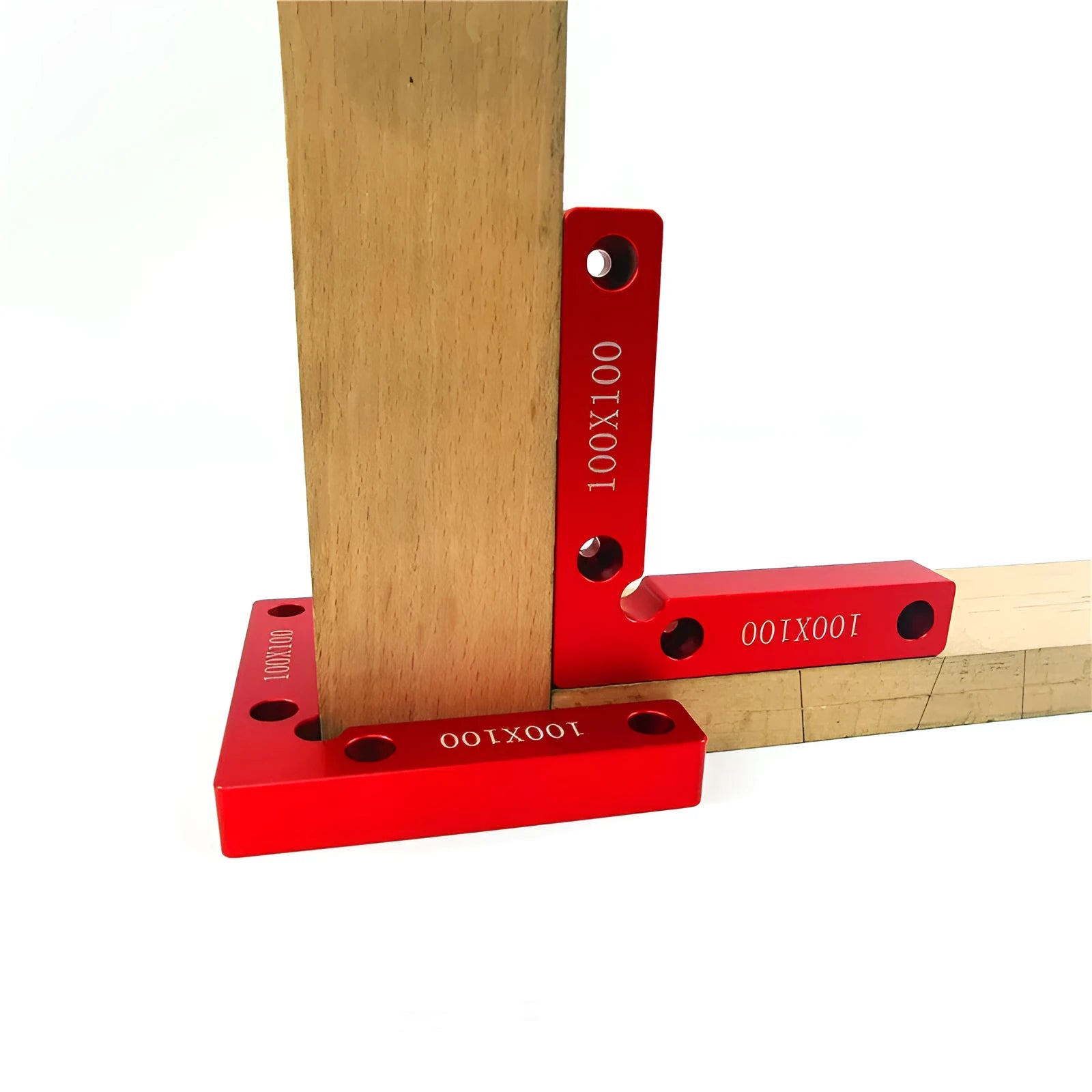 Aluminium alloy right angle positioning block for woodworking jigsaws with measurement scale.